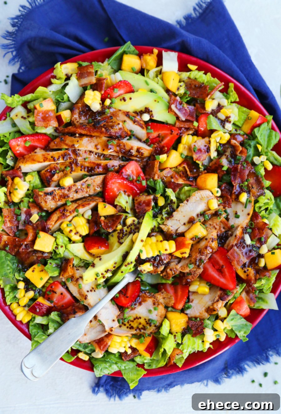 A vibrant close-up of the Honey Mustard Chicken Salad, ready for serving