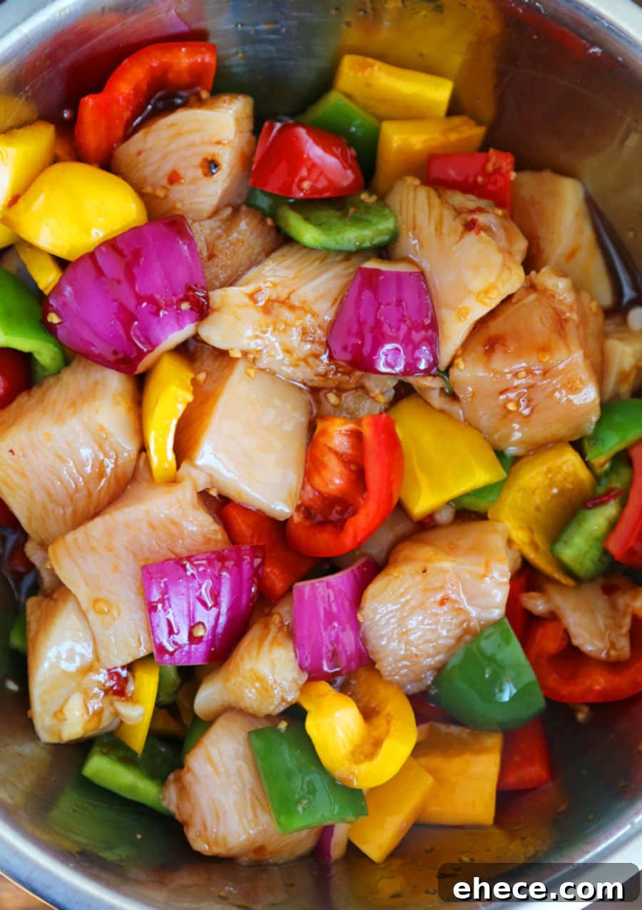 Island Glazed Chicken Skewers 3 Sweet Chili Hawaiian Chicken Skewers on a dark background, ready to be eaten