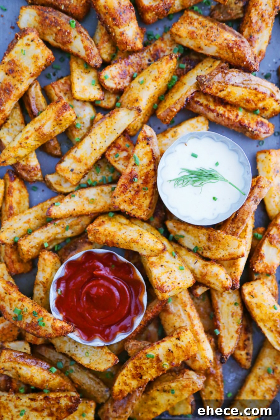 Crispy Garlic Parmesan Potato Wedges on a serving platter