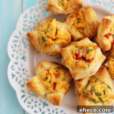 Flaky Golden Quiche Bites 5 Finished Mini Puff Pastry Quiche presented beautifully, ready to be served for brunch.