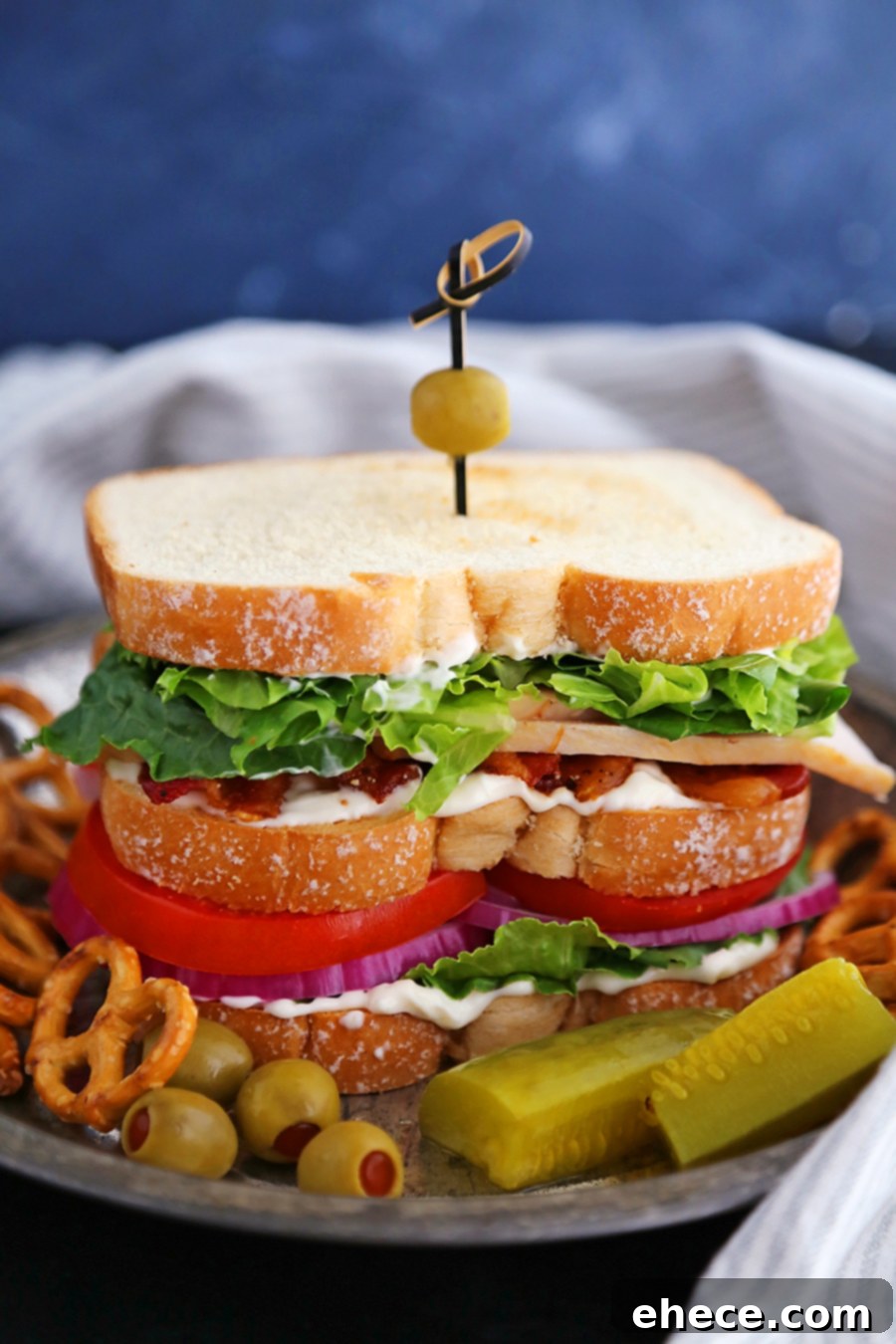 Elevated Turkey Bacon Club Sandwich 2 Delicious triple-stacked Turkey Bacon Club Sandwich