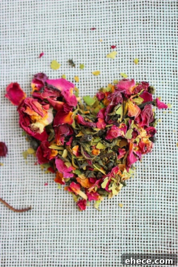 Close-up of DIY tea bags ingredients: cheesecloth, loose leaf tea, and colorful twine.