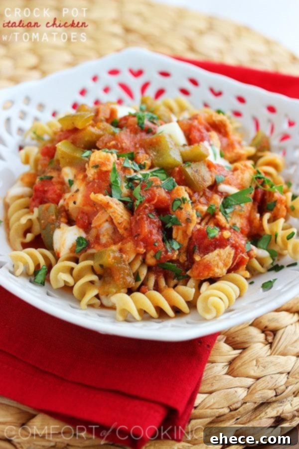 Slow Cooker Tuscan Tomato Chicken 2 Delicious Slow Cooker Italian Chicken with Tomatoes served over pasta