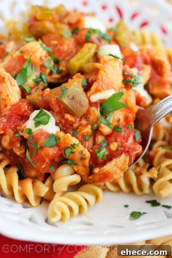 Slow Cooker Tuscan Tomato Chicken 4 Slow Cooker Italian Chicken with Tomatoes cooking in the pot