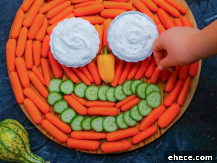 Pumpkin Veggie Tray complete with Ranch dip eyes.