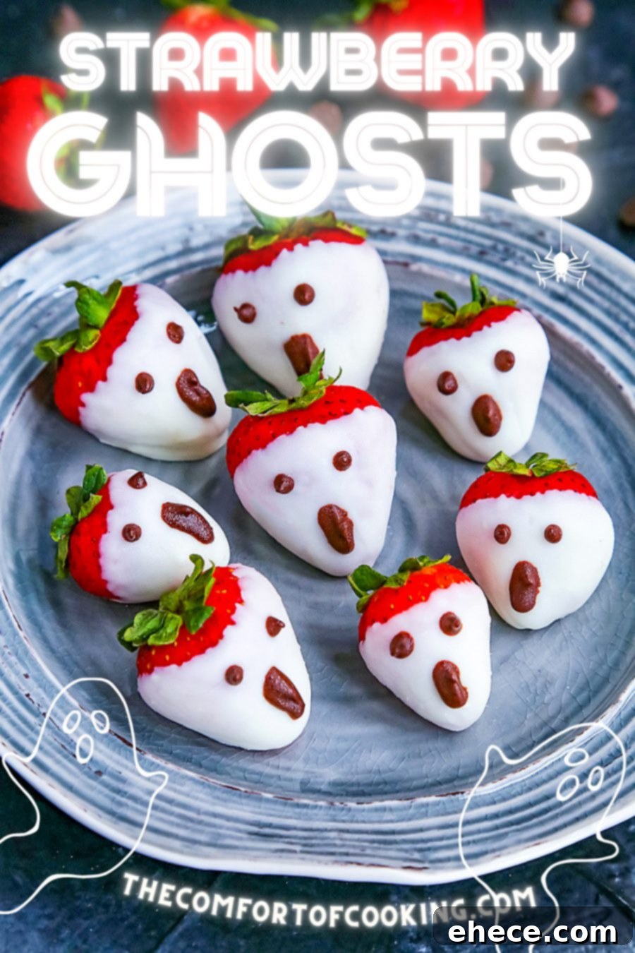 A close-up shot of several strawberry ghosts arranged neatly on a dark platter.
