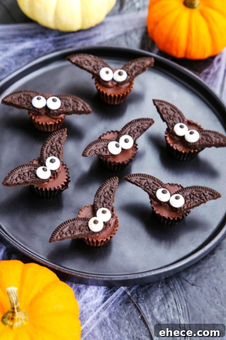 Mini Peanut Butter Cup Bats on a decorative plate
