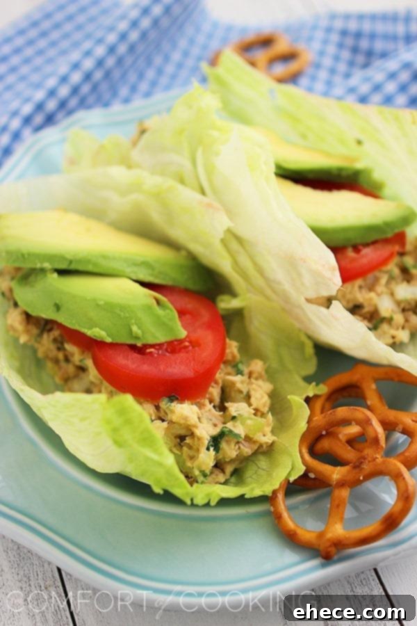 Avocado Tuna Salad Lettuce Wraps – For a delicious & quick low-carb lunch, mix up these tuna lettuce wraps with avocado! | thecomfortofcooking.com