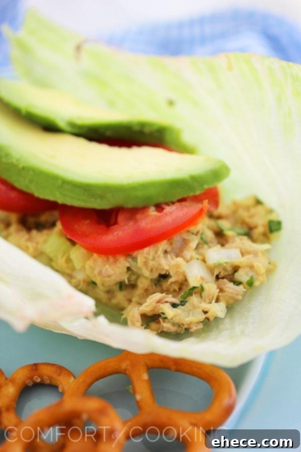 Avocado Tuna Salad Lettuce Wraps – For a delicious & quick low-carb lunch, mix up these tuna lettuce wraps with avocado! | thecomfortofcooking.com