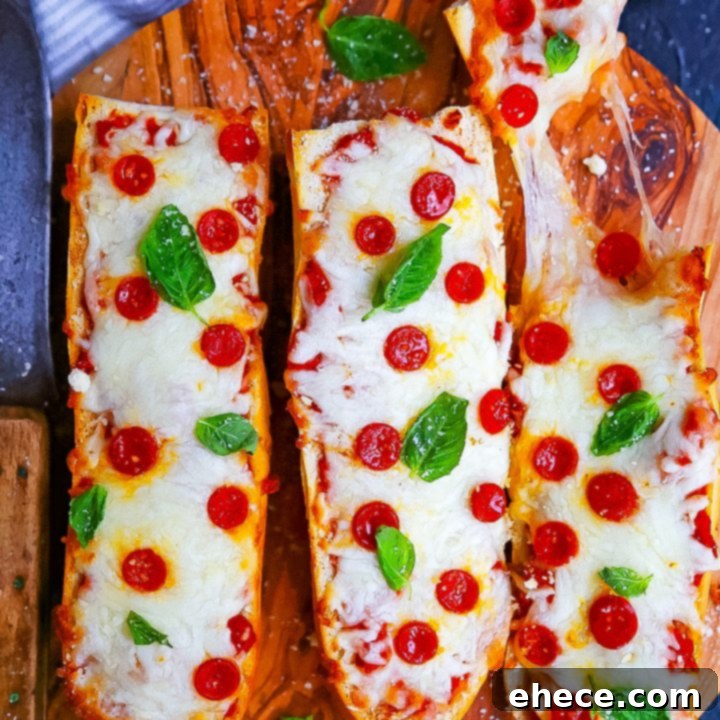 Easy French Bread Pizzas with golden melted cheese