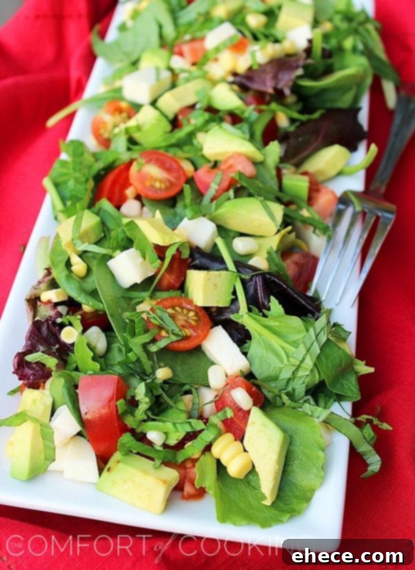 Vibrant Tomato Avocado Corn Basil Salad with Lemon Balsamic Vinaigrette 2 Vibrant Tomato, Avocado, Corn and Basil Salad with Lemon-Balsamic Vinaigrette, perfect for summer meals.