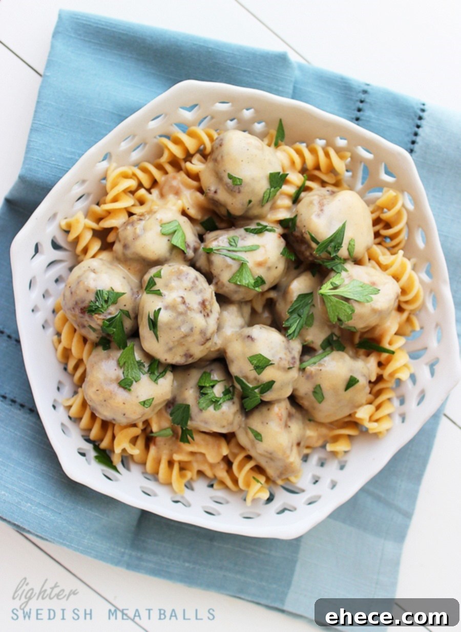 Lighter Swedish Meatballs served over pasta