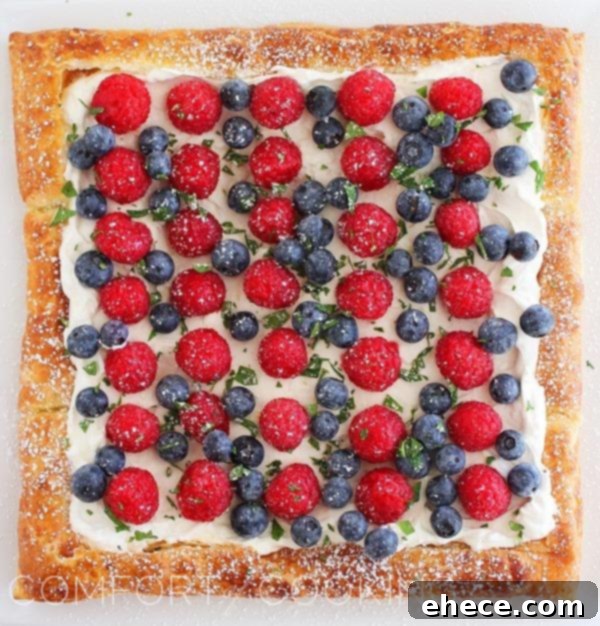 Delicious and vibrant Summer Berry Tart, perfect for a summer gathering or July 4th celebration.