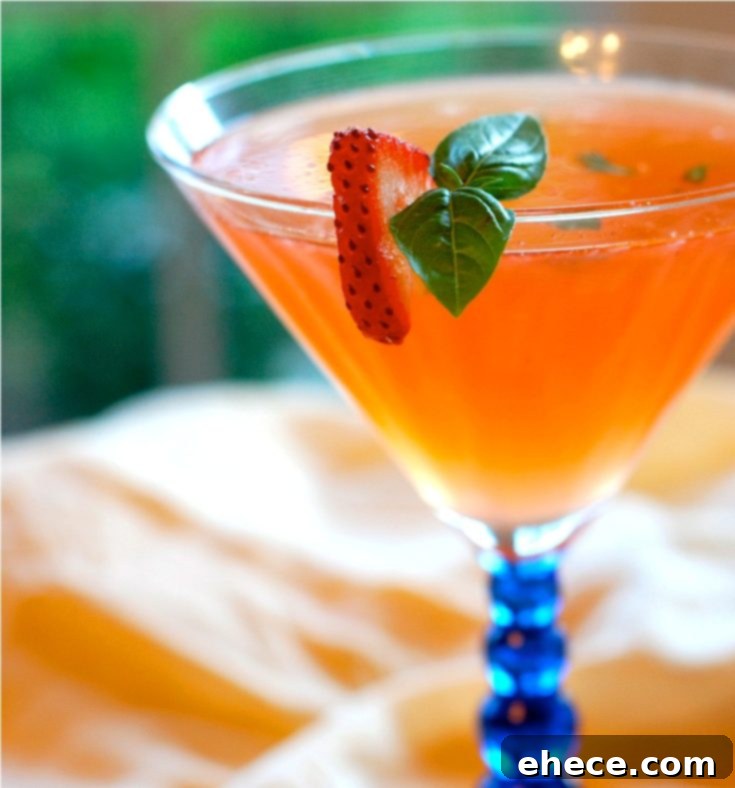 Strawberry Basil Cocktail with blog branding, encouraging sharing