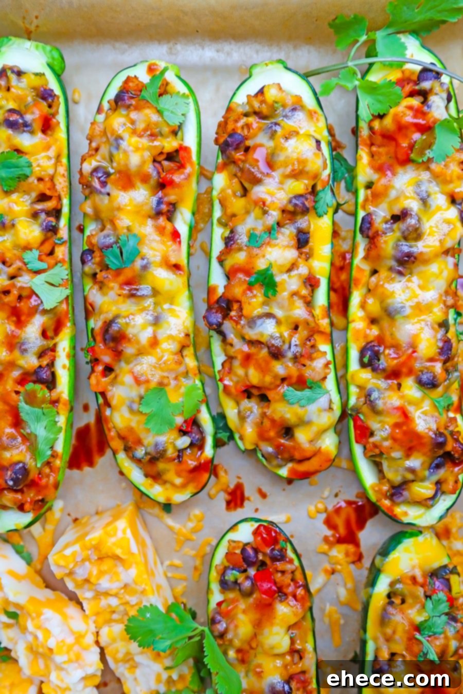Fiesta Stuffed Zucchini 5 Platter of finished zucchini boats with fresh cilantro