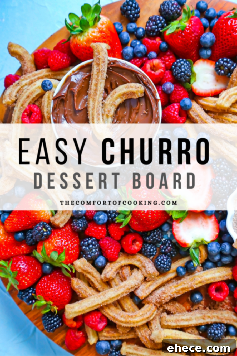 A beautifully decorated Churro and Berry Dessert Board ready for serving at a party.