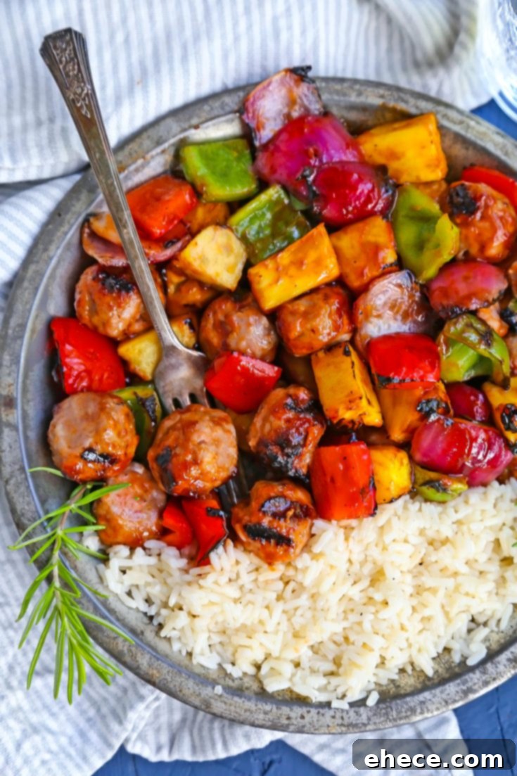 BBQ Sausage, Veggie + Pineapple Skewers with a Pinterest description