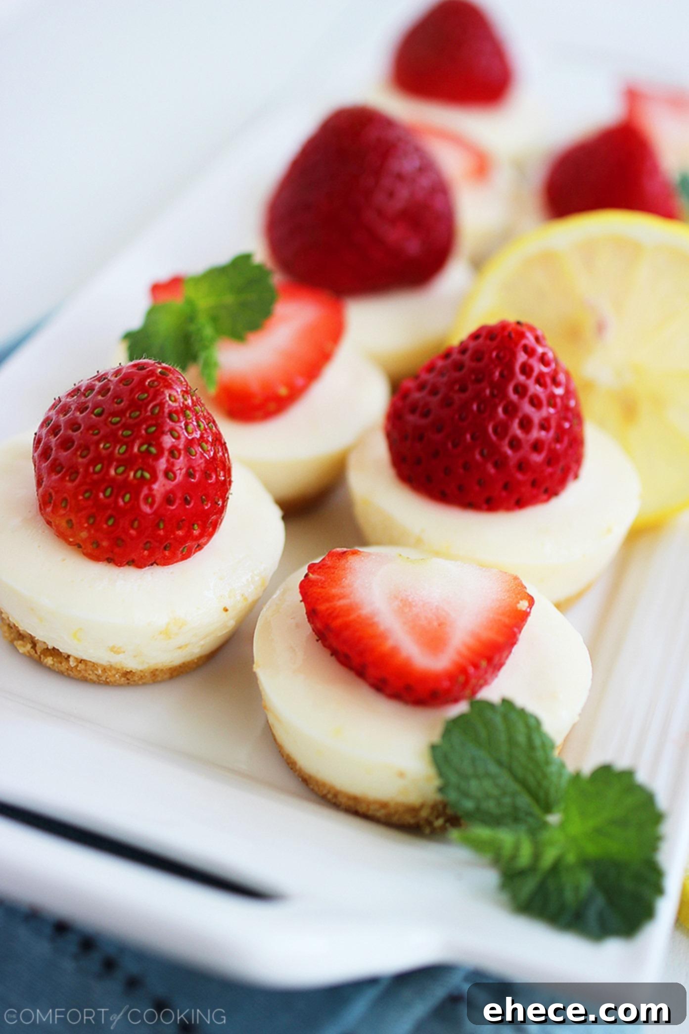 Close-up of a No-Bake Strawberry Lemonade Bite with fresh strawberry slices on top