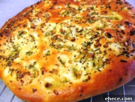 Delicious Rosemary Focaccia Bread with caramelized onions and garlic