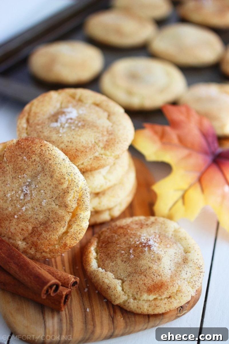 Sea Salt Caramel Snickerdoodle Pockets 2 Warm Sea Salt Caramel Stuffed Snickerdoodles with a gooey caramel center, perfect for a cozy treat. A close-up showing the melted caramel and cinnamon sugar coating.