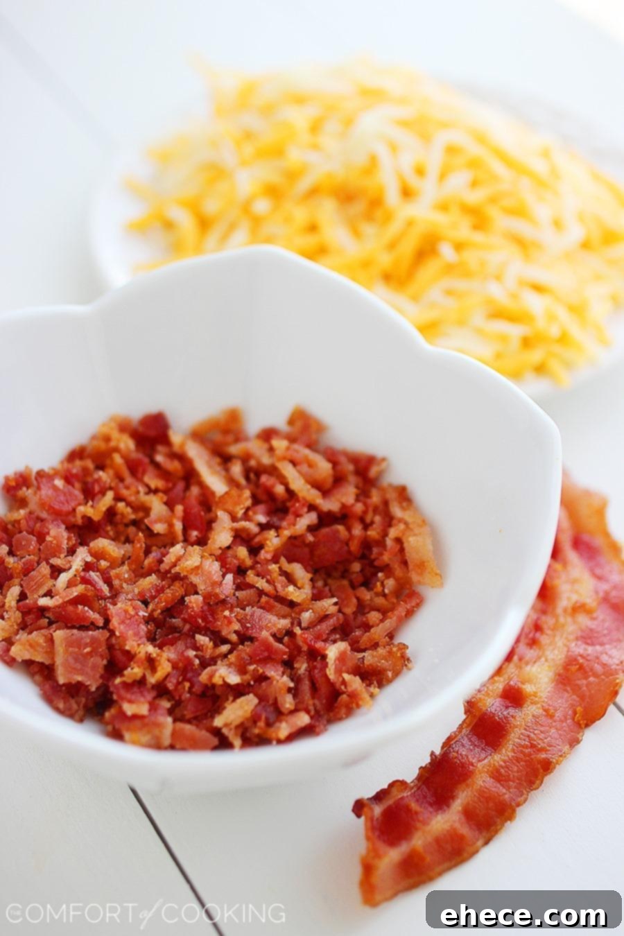 Loaded Crispy Bacon Cheese Fries with Fiery Chipotle Ranch 3 Homemade Cheesy Bacon Oven Chips with herbs, ready to be dipped in creamy Chipotle Ranch sauce – A delicious, easy-to-make appetizer for any gathering.