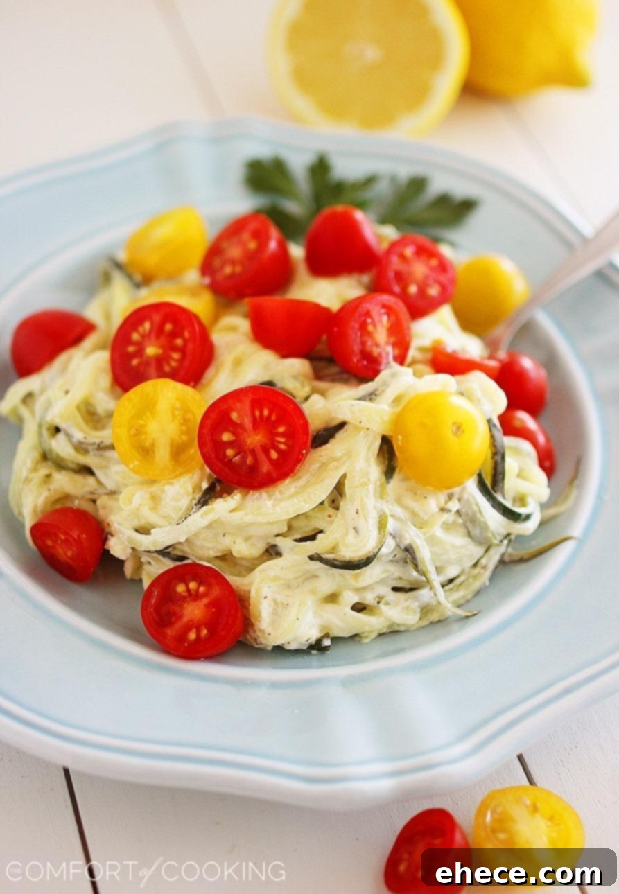 Creamy Lemon Zucchini Noodles with Fresh Tomatoes - A healthy and delicious low-carb pasta alternative for any meal.