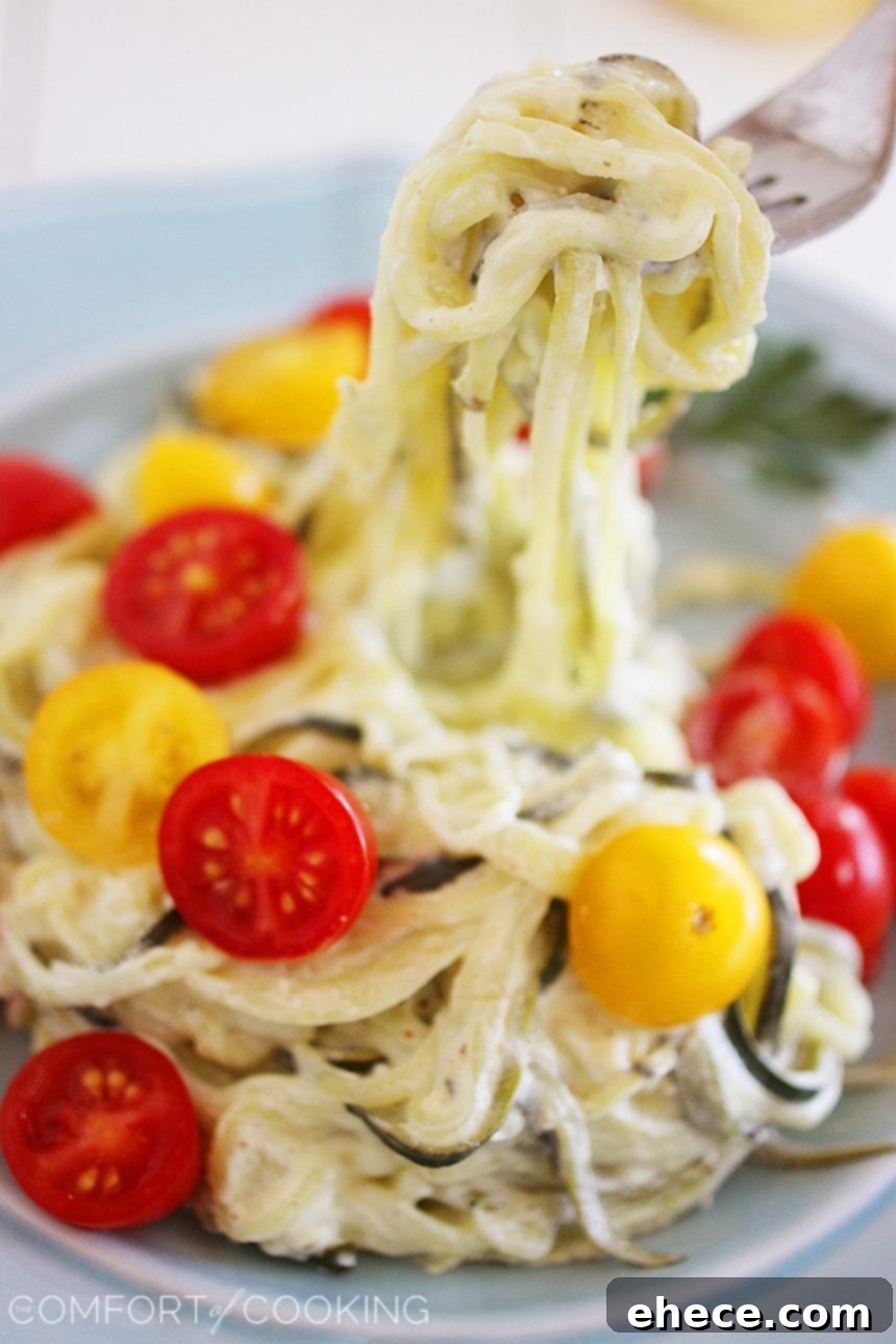Creamy Lemon Zucchini Noodles with Tomatoes – These “noodles” are low-carb, fun to make, and delish for a light meal!| thecomfortofcooking.com