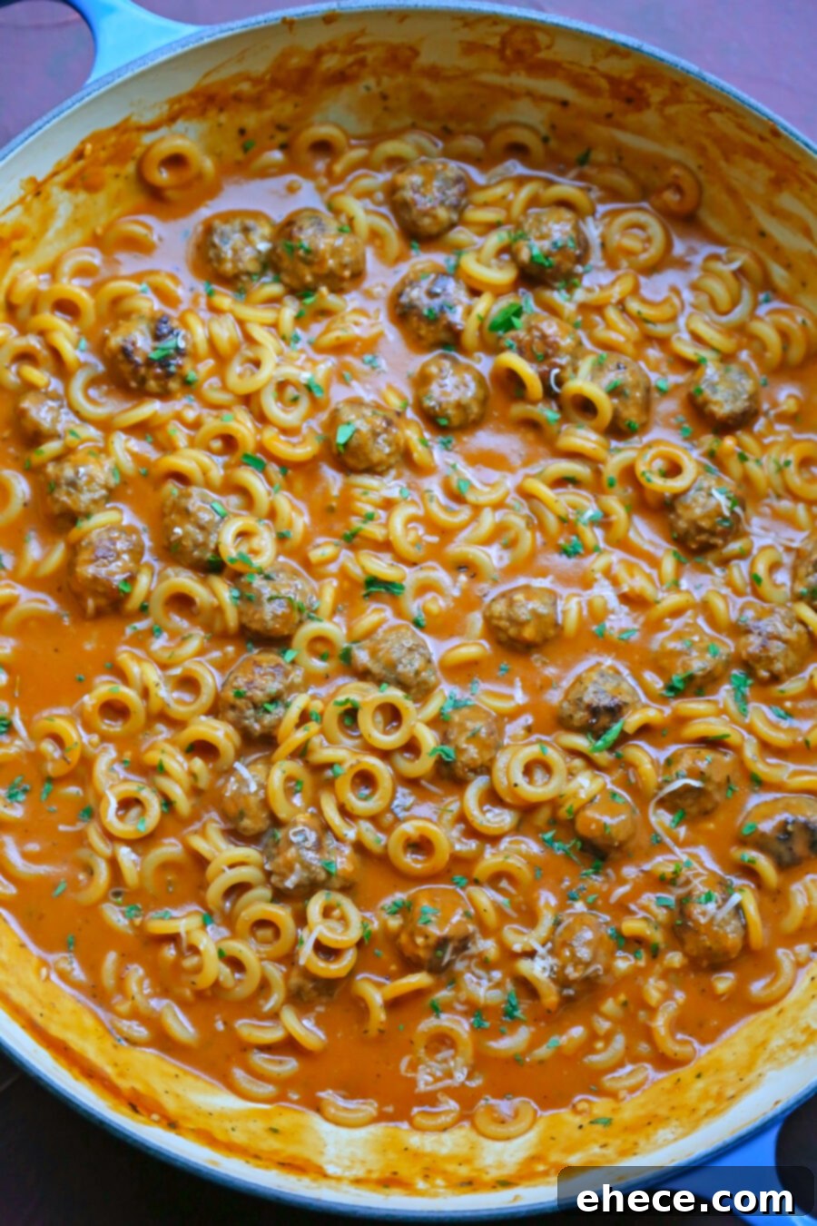 One-Pan Homemade Spaghettios with mini meatballs in a skillet
