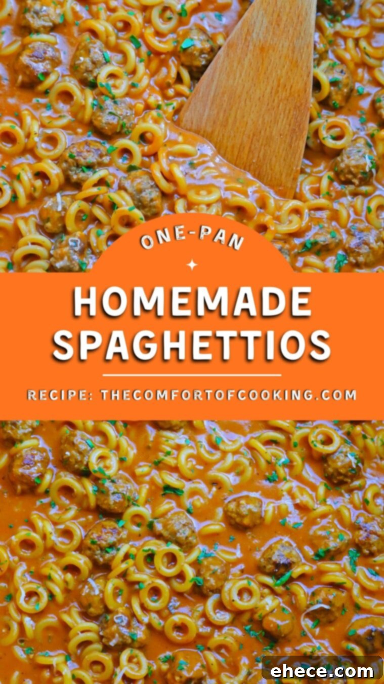 Two hands holding bowls of One-Pan Homemade SpaghettiOs