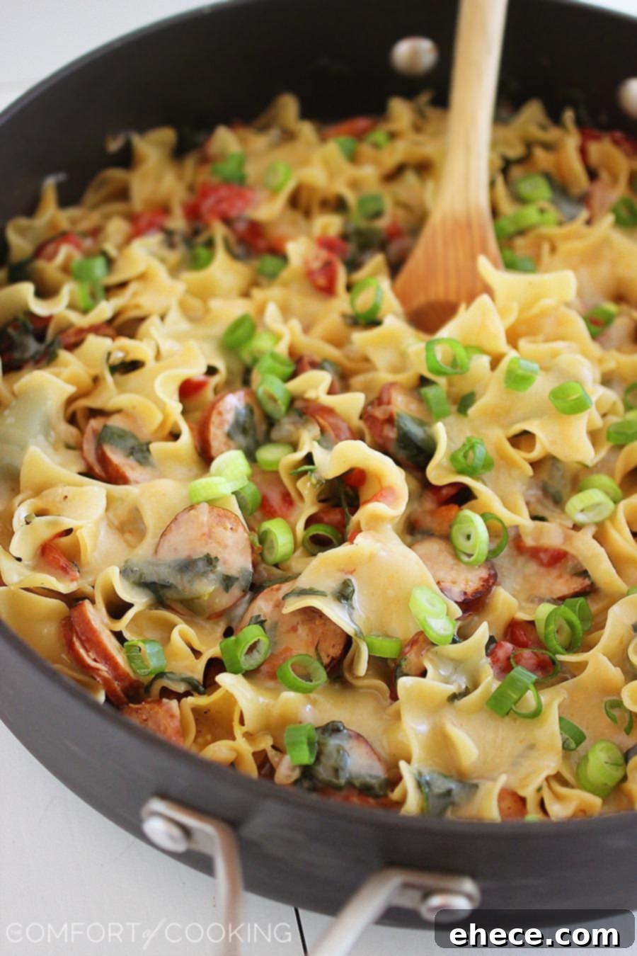 Creamy Sausage and Spinach Pasta Skillet – Creamy, delicious and a cinch to make for a satisfying one-pan weeknight dinner!