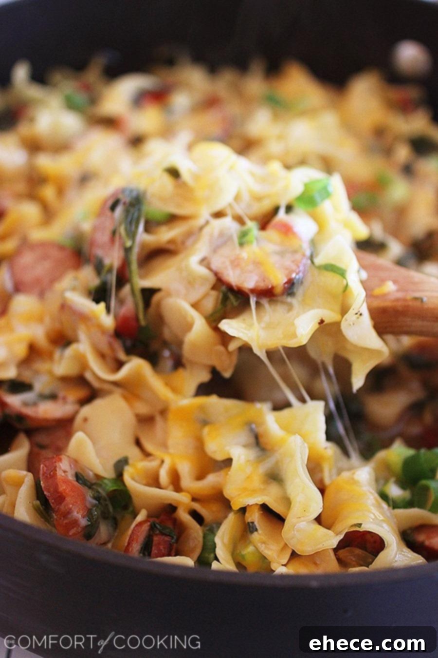 Creamy Sausage and Spinach Pasta Skillet – Creamy, delicious and a cinch to make for a satisfying one-pan weeknight dinner!