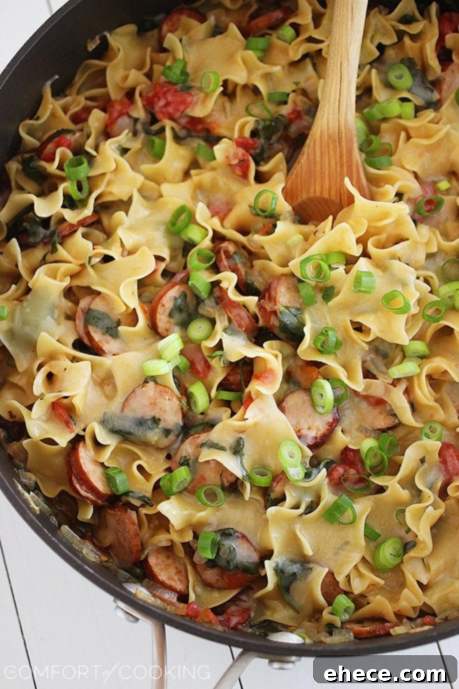 Creamy Sausage and Spinach Pasta Skillet – Creamy, delicious and a cinch to make for a satisfying one-pan weeknight dinner!