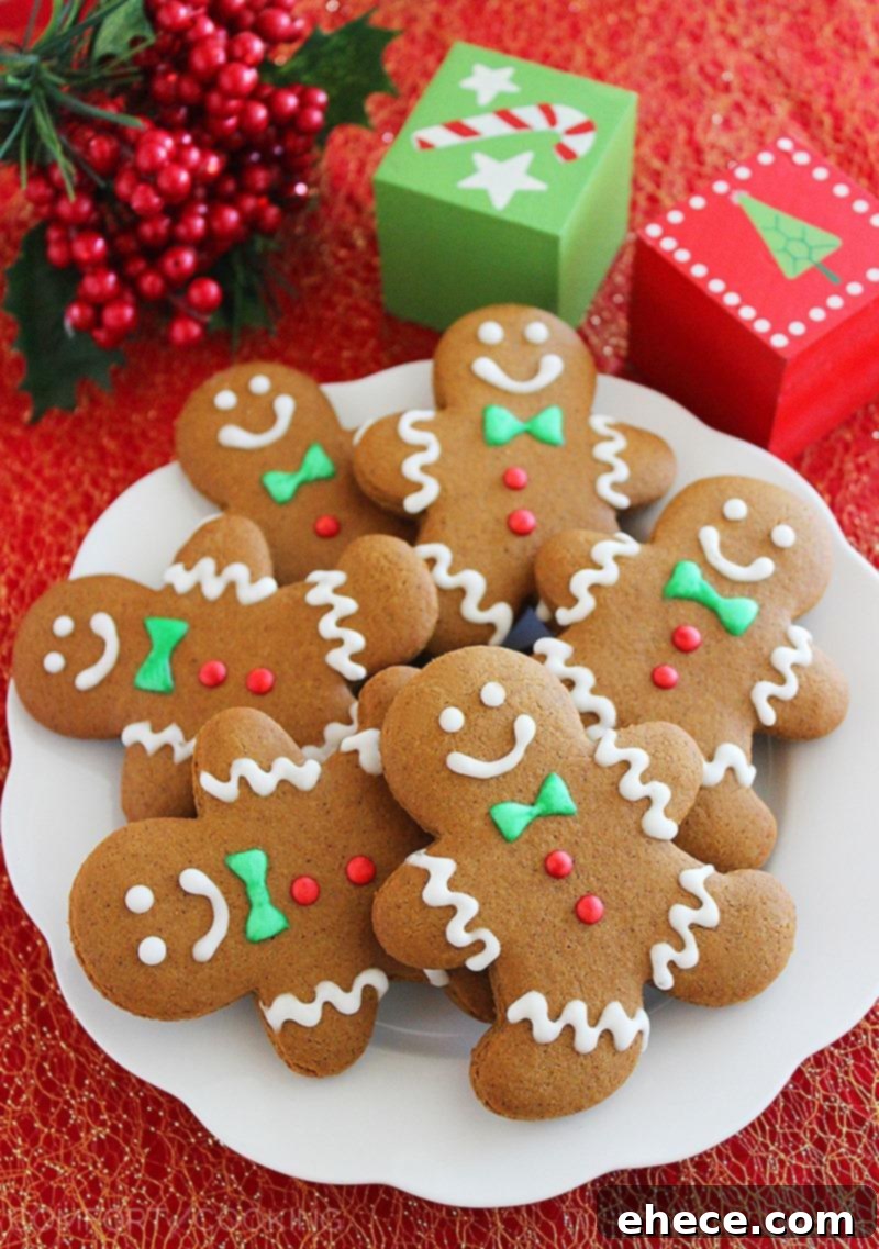 Soft and festive gingerbread man cookies, decorated for the holidays.