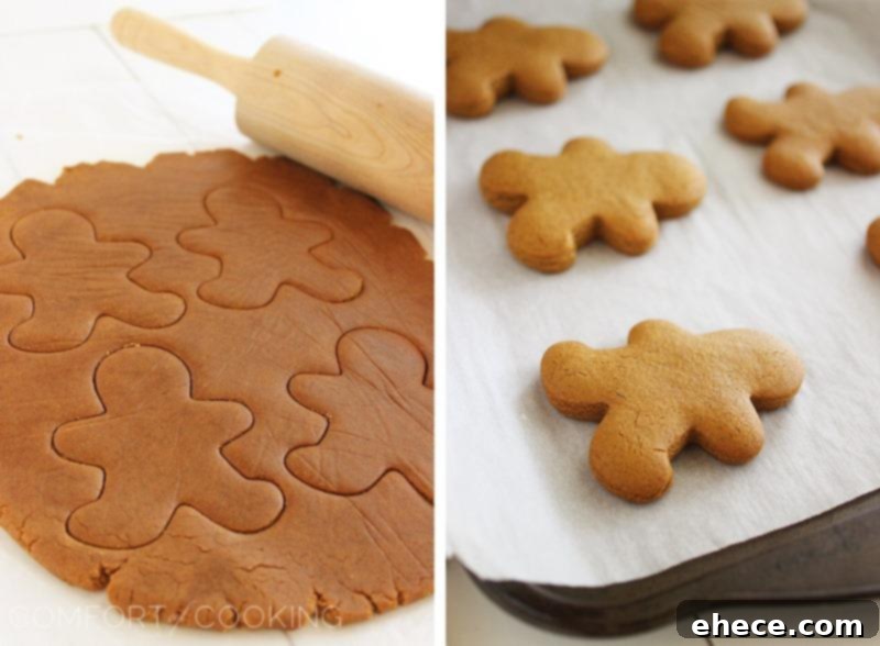 A tray of freshly baked gingerbread man cookies ready for decorating.