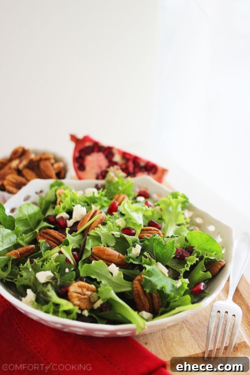 Jeweled Greens with Feta and Pecans 6 Overhead shot of the colorful Mixed Green Salad with Pomegranate, Feta, and Pecans, ready to be served.