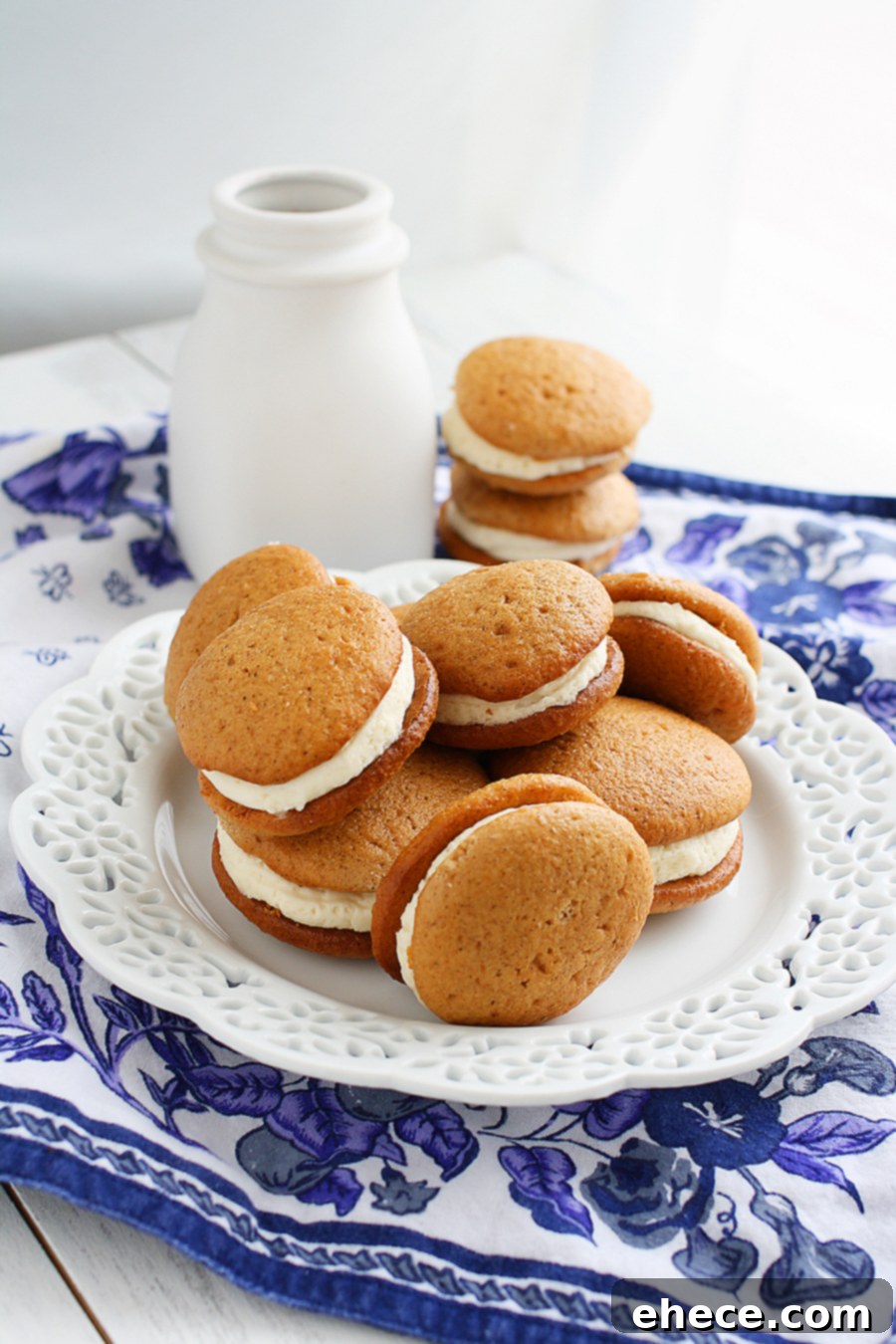 Spiced Gingerbread Whoopie Pies 2 Freshly baked Gingerbread Whoopie Pies cooling on a rack, ready for filling and dusting