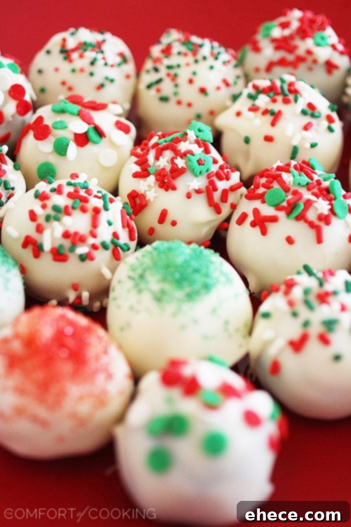 Effortless Oreo Truffle Bites 5 No-Bake Oreo Truffles – Assortment of classic and Golden Oreo truffles, some with white chocolate and sprinkles, some plain, showcasing variety.