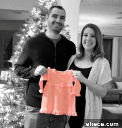 Sparkling Rosé Cupcakes 3 Adorable baby items hinting at a new arrival.