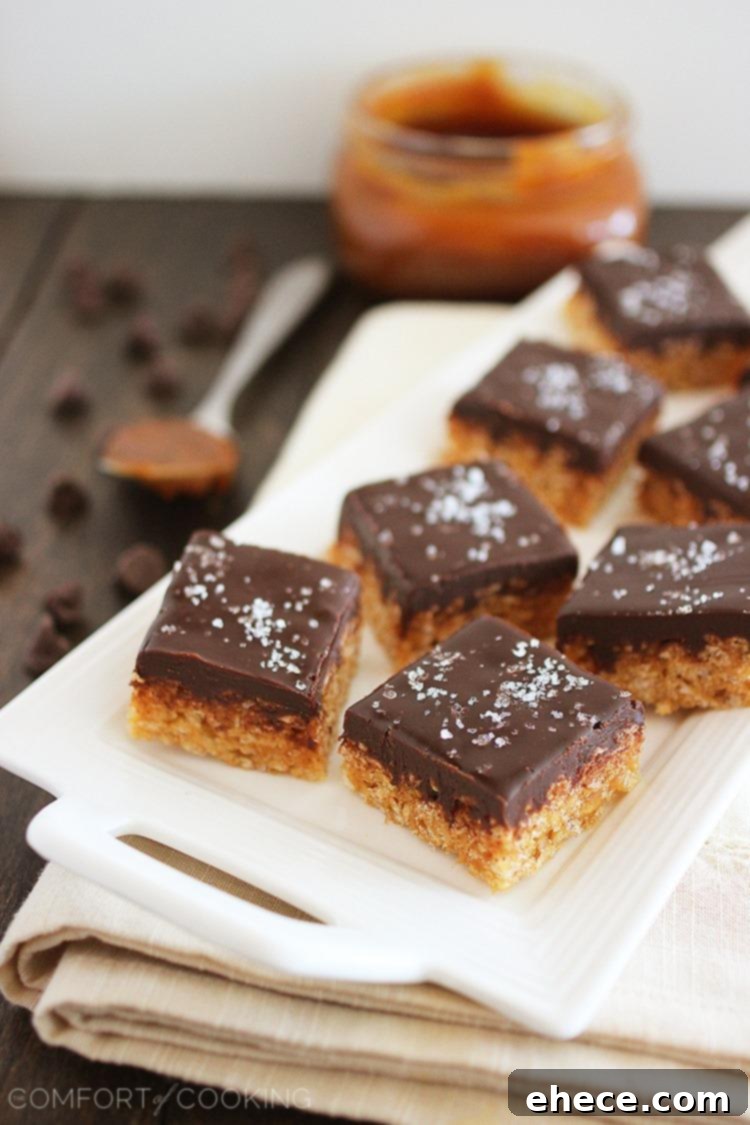 Salted Caramel Chocolate Crispy Squares 2 Salted Caramel Chocolate Rice Krispie Treats – With chocolate ganache and sea salt, these treats are little bites of bliss. So easy and elegant. Get the recipe! | thecomfortofcooking.com