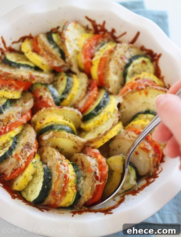 Golden Baked Parmesan Vegetable Tian 7 Parmesan Vegetable Tian – Our all-time favorite side dish! Layered potatoes, zucchini, tomatoes and squash, baked 'til tender & crisp with a cheesy Parmesan topping. Healthy, colorful and delicious on the side of roasted meats! | thecomfortofcooking.com