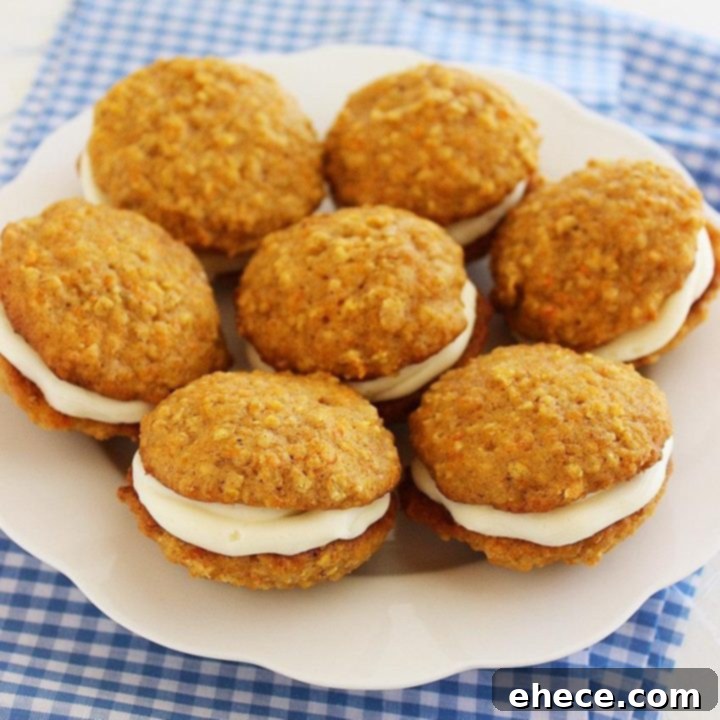 Soft Carrot Cake Sandwich Cookies with Cream Cheese Frosting - A delicious recipe for tender, spiced cookies filled with creamy frosting.