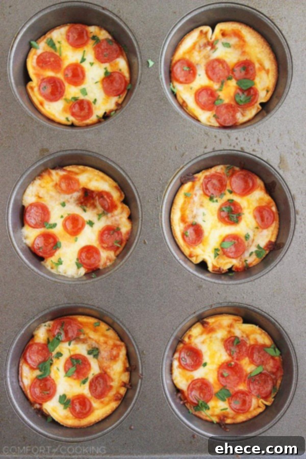A vibrant platter of freshly baked Mini Tortilla Pizzas, garnished with fresh herbs, perfect for a party.