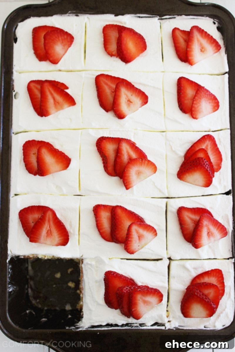 Strawberry Dream Tres Leches 5 Pouring the luscious three milks mixture over a freshly baked sponge cake, a crucial step for the ultimate Tres Leches.