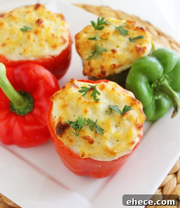 Italian Mac and Cheese Stuffed Peppers – Gooey, golden mac and cheese baked 'til bubbly in bell peppers makes a delicious, easy vegetarian side (or main meal)! | thecomfortofcooking.com