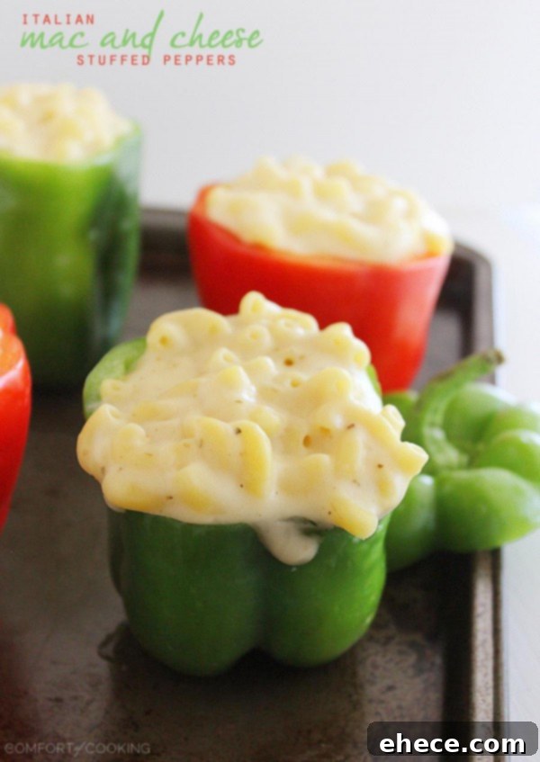 Italian Mac and Cheese Stuffed Peppers – Gooey, golden mac and cheese baked 'til bubbly in bell peppers makes a delicious, easy vegetarian side (or main meal)! | thecomfortofcooking.com