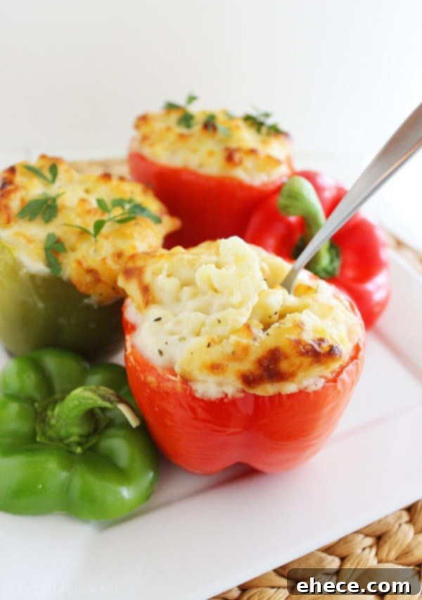 Italian Mac and Cheese Stuffed Peppers – Gooey, golden mac and cheese baked 'til bubbly in bell peppers makes a delicious, easy vegetarian side (or main meal)! | thecomfortofcooking.com