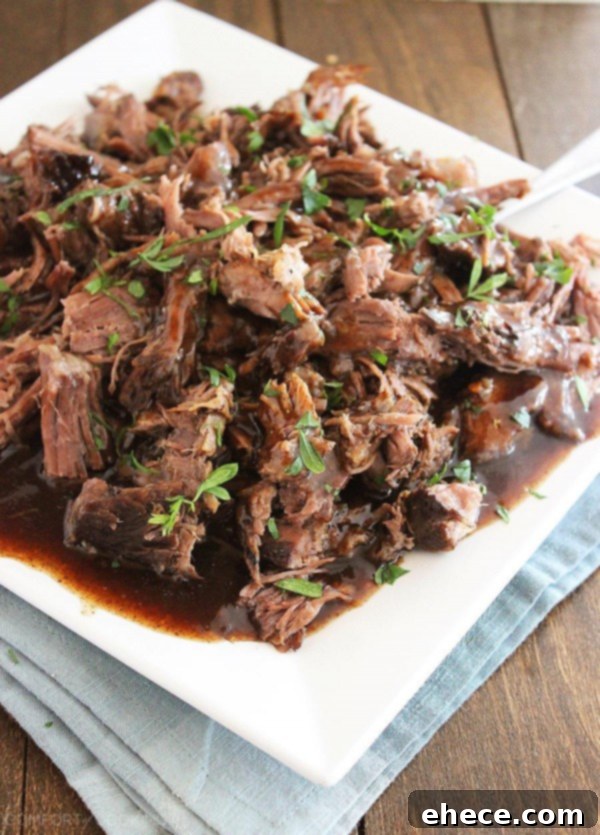 Slow Cooker Balsamic Glazed Roast Beef - Tender, flavorful beef with a rich glaze, perfect for a cozy meal.