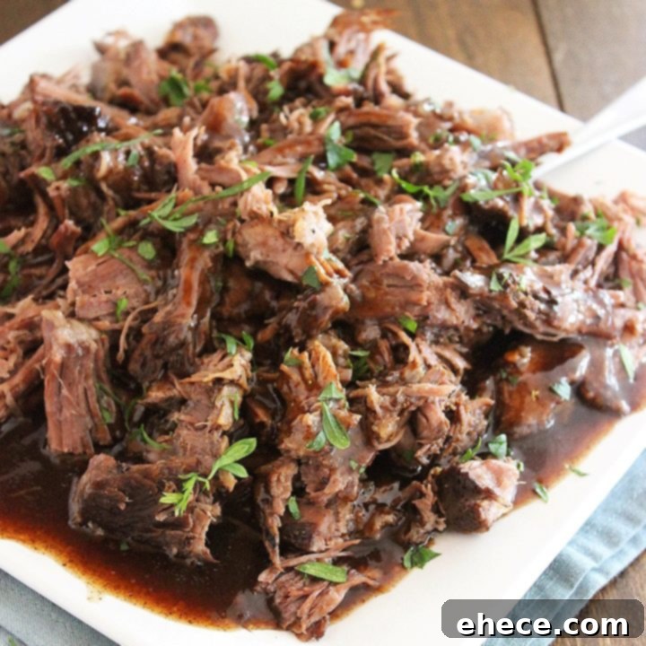 Slow Cooker Balsamic Glazed Roast Beef with a rich, glossy glaze.