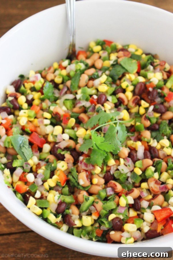 Texas Caviar – Fresh, zesty corn salad with beans, bell peppers, and jalapenos, perfect for summer meals and parties.