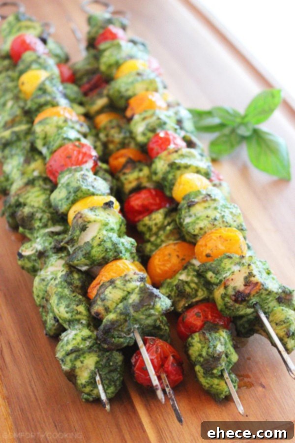 Zesty Pesto Chicken & Sun-Kissed Tomato Skewers 2 Grilled Pesto Chicken Skewers with Tomatoes